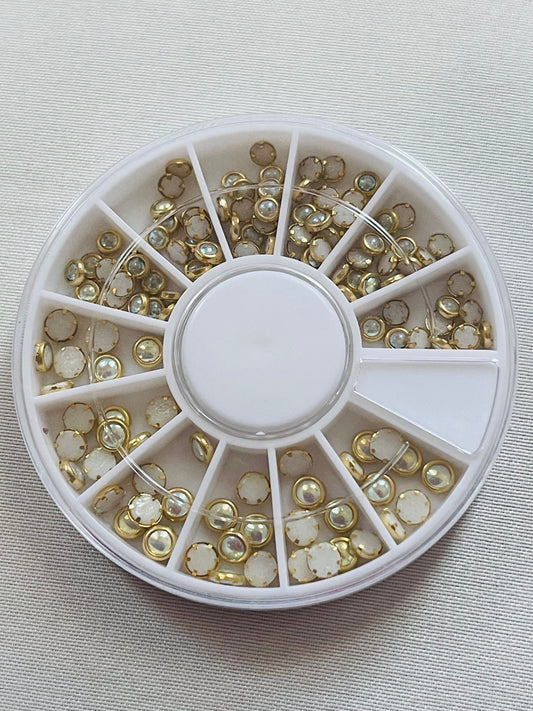 Gold wrapped Iridescent Pearls